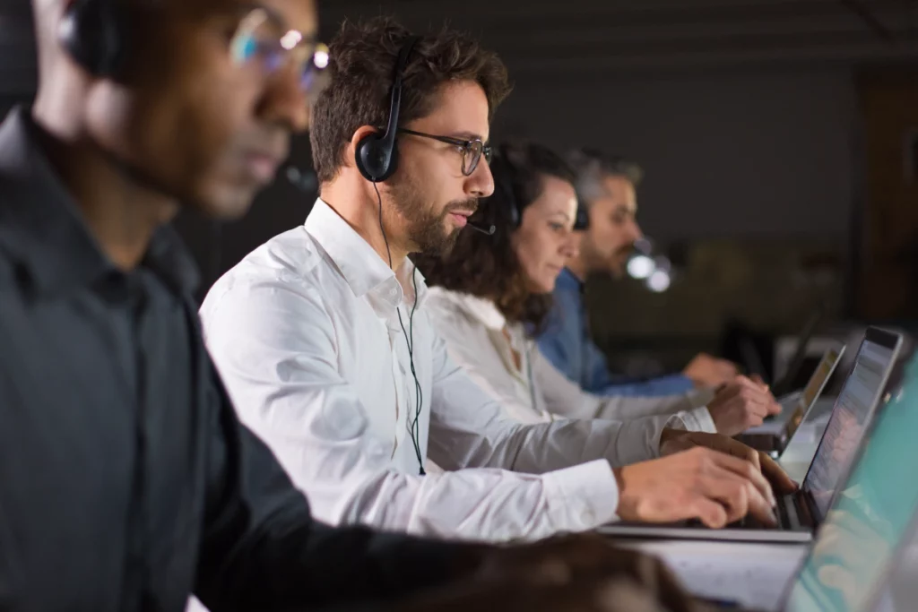 Confident Call Center Operator Talking With Client