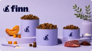 Finn dog wellness supplements arranged in lavender tins